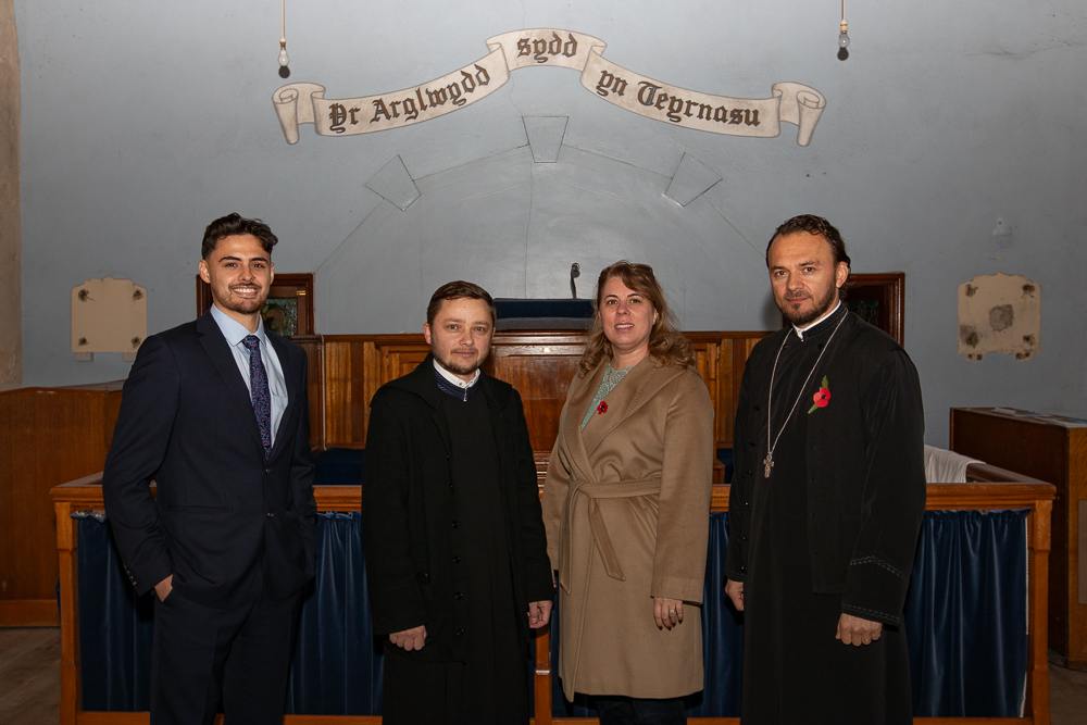 Alex Kurtz-Shefford with Diana Stroia, Fr. Vasile Flavian Branescu and Fr. Ioan Claudiu Moldovan.