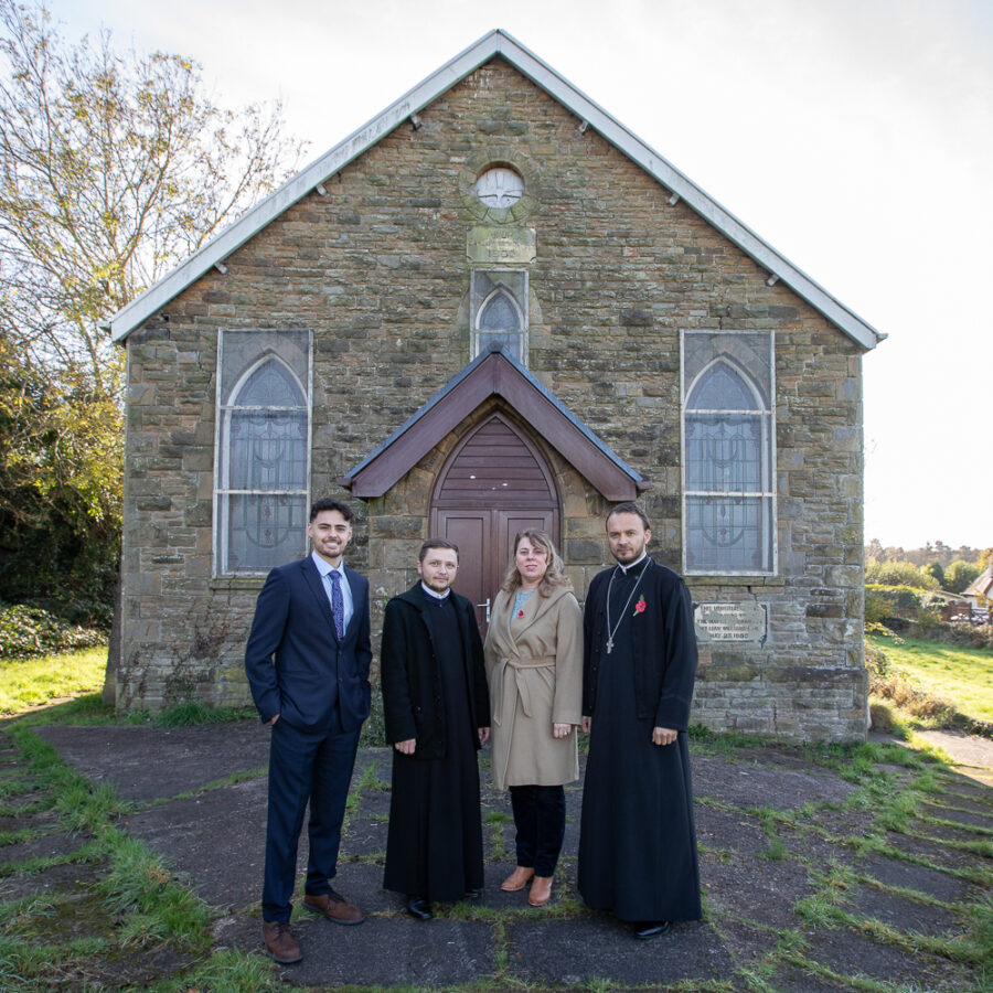 Alex Kurtz-Shefford with Diana Stroia, Fr. Vasile Flavian Branescu and Fr. Ioan Claudiu Moldovan.